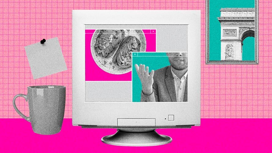imagem de um computador rosa em cima de uma mesa